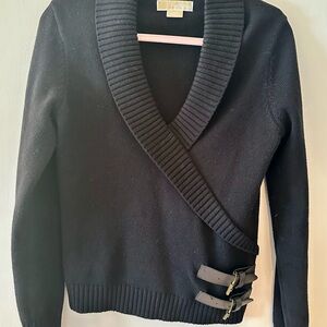 Michael Kors black knit wrap sweater with buckles.